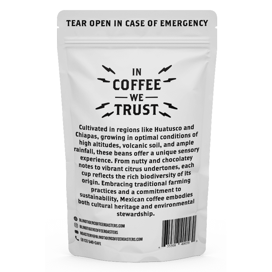 Coffee packaging with 'In Coffee We Trust' text on a green background