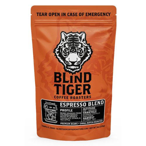 Orange package of Blind Tiger Coffee Roasters Espresso Blend with a tiger logo.