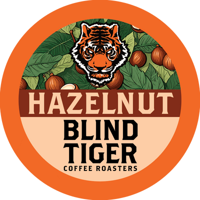 Label for Hazelnut Blind Tiger Coffee Roasters with a tiger illustration and coffee beans.